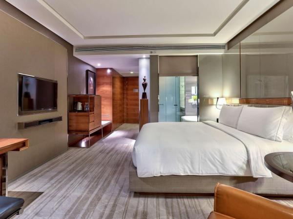 Hilton Sukhumvit Bangkok : photo 3 de la chambre chambre lit king-size excutive