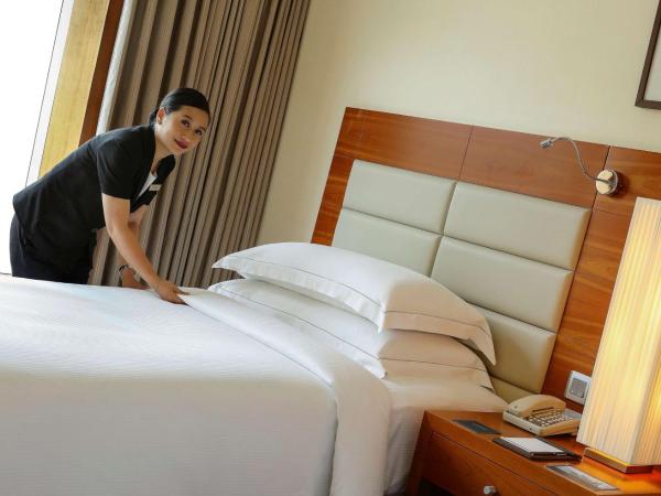 Hilton Bangalore Embassy GolfLinks : photo 7 de la chambre chambre lits jumeaux