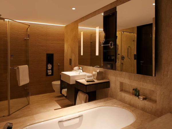 Hilton Jaipur : photo 1 de la chambre chambre lit king-size