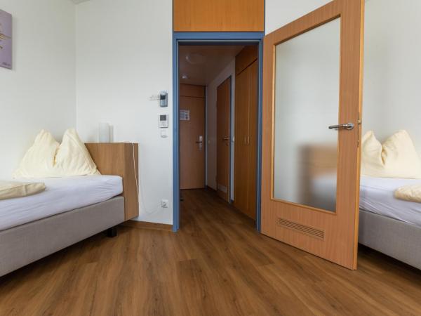 Hotel Sommerhaus Linz : photo 2 de la chambre chambre lits jumeaux