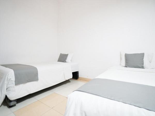 Griya Sawamah Syariah Mitra RedDoorz : photo 2 de la chambre chambre lits jumeaux