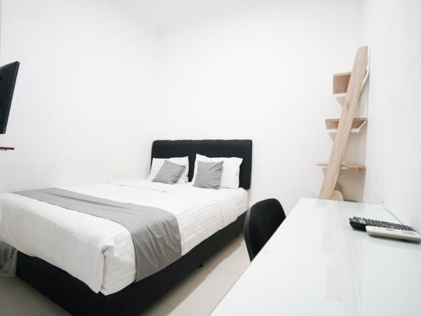 Griya Sawamah Syariah Mitra RedDoorz : photo 2 de la chambre chambre double standard