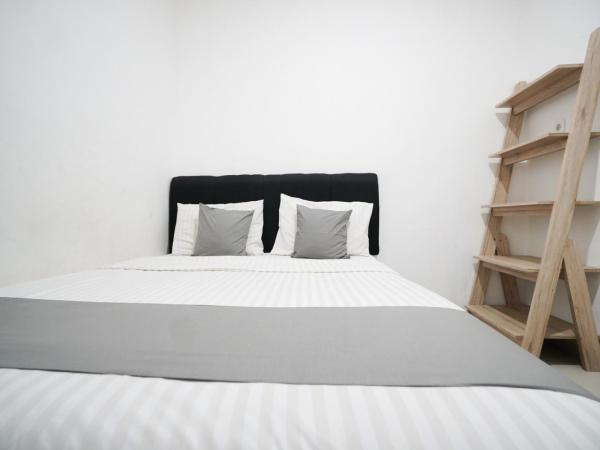 Griya Sawamah Syariah Mitra RedDoorz : photo 8 de la chambre chambre double standard