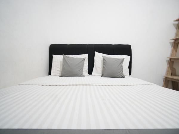 Griya Sawamah Syariah Mitra RedDoorz : photo 7 de la chambre chambre double standard