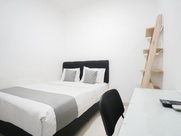 Griya Sawamah Syariah Mitra RedDoorz : photo 4 de la chambre chambre double standard