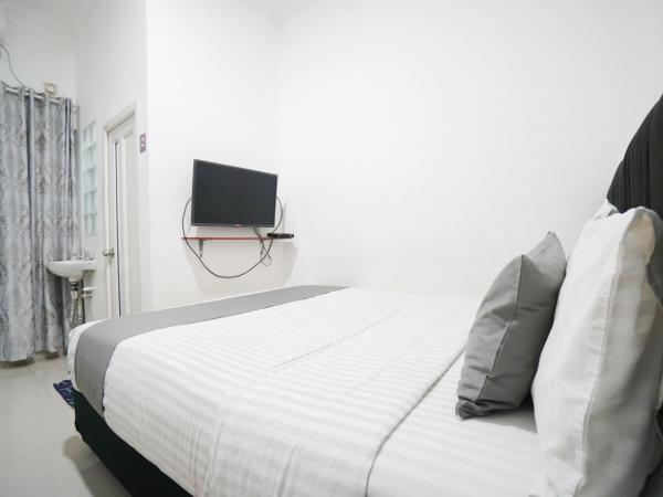 Griya Sawamah Syariah Mitra RedDoorz : photo 3 de la chambre chambre double standard