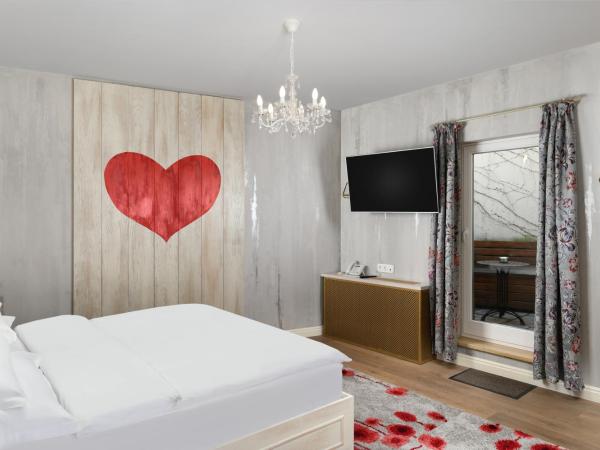 Maison Bistro & Hotel : photo 2 de la chambre grande chambre double ou lits jumeaux