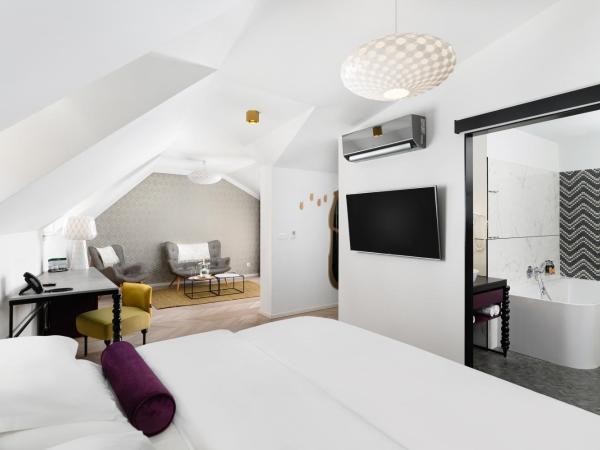 Maison Bistro & Hotel : photo 1 de la chambre suite dans petite maison