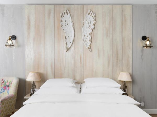 Maison Bistro & Hotel : photo 7 de la chambre grande chambre double ou lits jumeaux