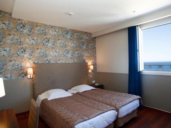 Hotel Restaurant Christophe Colomb : photo 1 de la chambre chambre lits jumeaux - vue sur mer