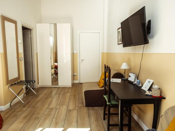 Il Tiro Rooms : photo 7 de la chambre chambre triple avec salle de bains privative