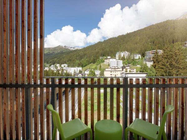 Hilton Garden Inn Davos : photo 1 de la chambre chambre lit king-size