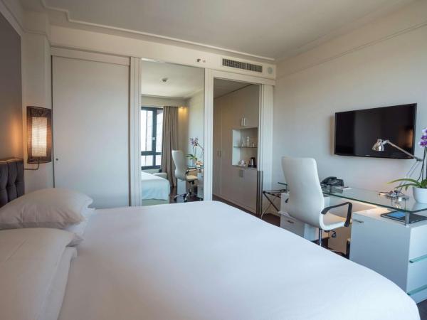 Hilton Florence Metropole : photo 3 de la chambre chambre lit king-size exécutive