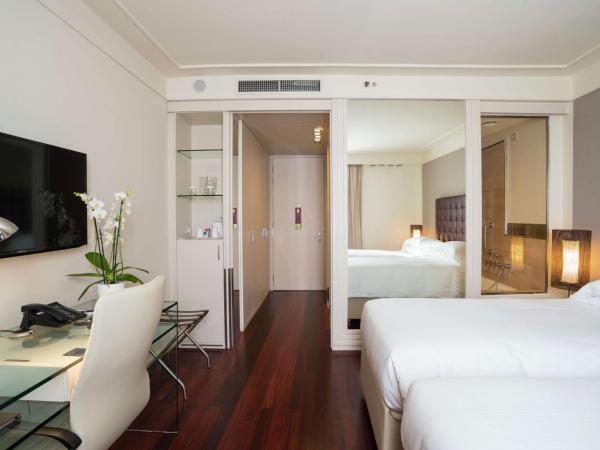 Hilton Florence Metropole : photo 3 de la chambre chambre lits jumeaux exécutive