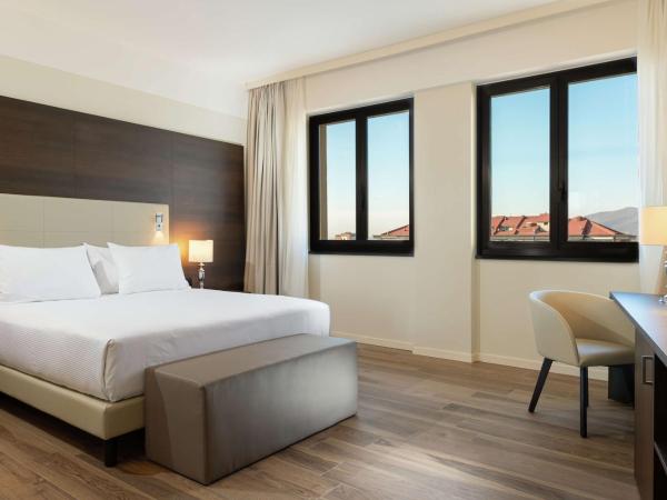 DoubleTree by Hilton Brescia : photo 1 de la chambre chambre lit king-size deluxe