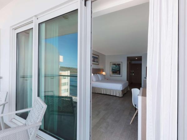 DoubleTree by Hilton Mazatlan, SIN : photo 1 de la chambre suite junior lit queen-size avec balcon - côté océan