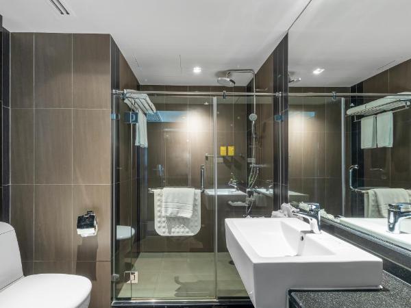 Golden Tulip Mandison Suites : photo 4 de la chambre chambre double deluxe