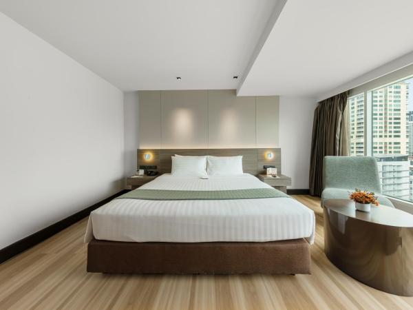 Golden Tulip Mandison Suites : photo 5 de la chambre chambre double deluxe