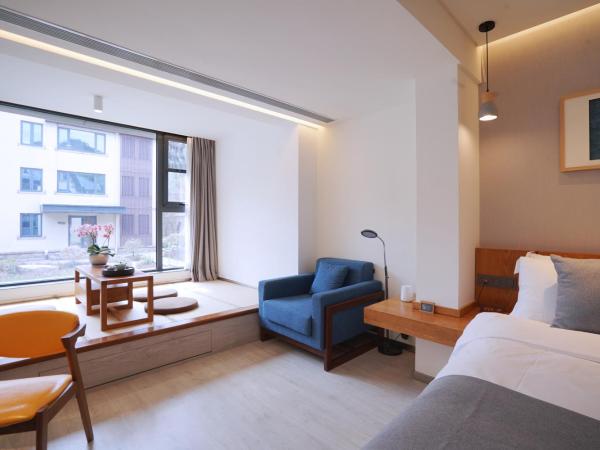 Jiushui Heyuan Art Design Hotel : photo 4 de la chambre chambre double deluxe