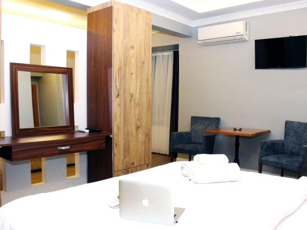 biglife hotel : photo 10 de la chambre chambre triple de luxe