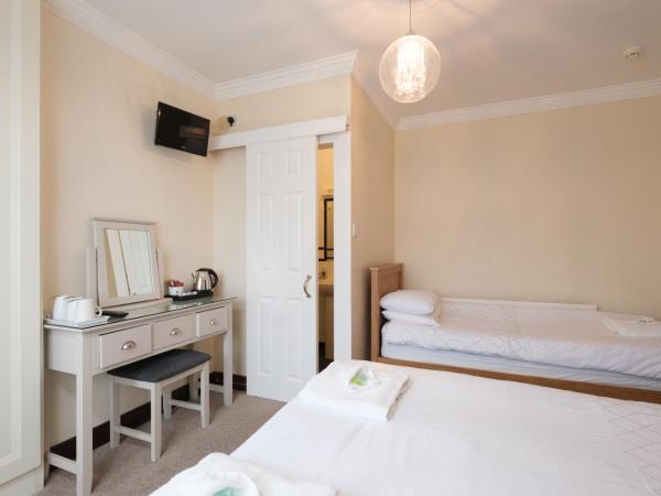 Four Seasons B&B : photo 2 de la chambre chambre triple avec douche