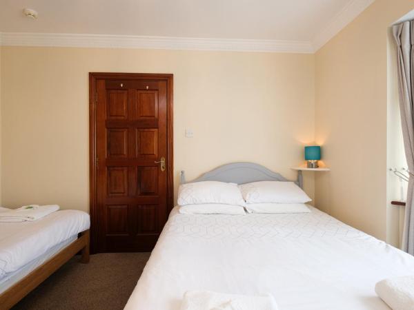 Four Seasons B&B : photo 1 de la chambre chambre triple avec douche