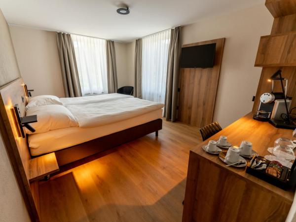 ZIEGELHÜSI Hotel, Stettlen bei Bern : photo 1 de la chambre chambre double ou lits jumeaux - côté rue