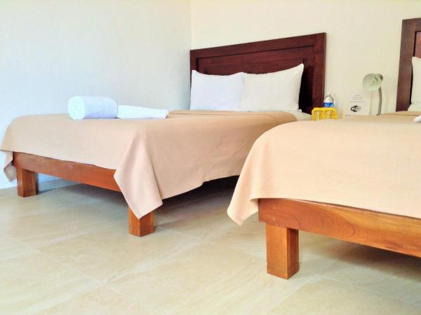 Posada Malix Pek : photo 2 de la chambre chambre avec 2 grands lits queen-size 