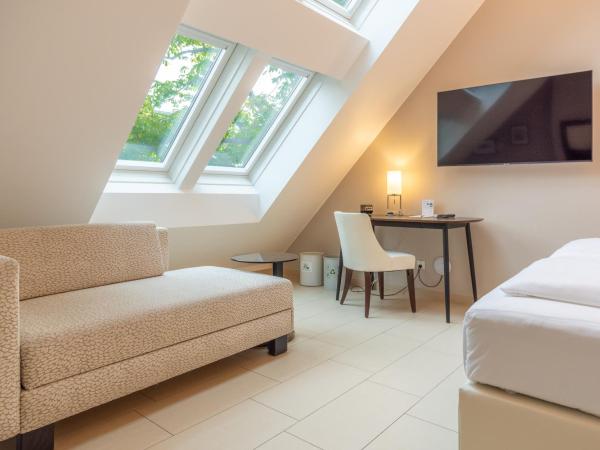 Hotel Spiess & Spiess : photo 3 de la chambre chambre double supérieure avec balcon ou terrasse - vue sur jardin