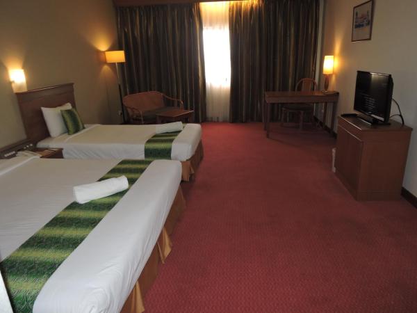 Hotel Grand Continental Kuching : photo 8 de la chambre chambre triple deluxe