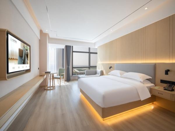 Deep Sleep Hotel Hangzhou Dajiang East Haide Xingang Center : photo 1 de la chambre chambre lits jumeaux deluxe