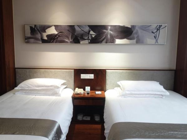 GreenTree Eastern Hotel Lihu Yuantouzhu Scenic Area : photo 1 de la chambre chambre lits jumeaux orientale