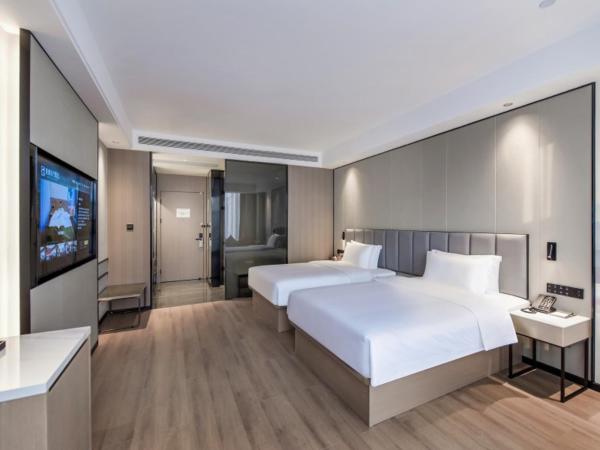 GreenTree Eastern Hotel Chongqing Jiefangbei International Airport Lushan Subway Station : photo 1 de la chambre chambre lits jumeaux avec vue