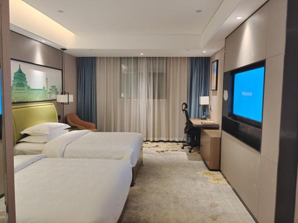 GreenTree Eastern Hotel Chongqing Jiefangbei Children's Hospital : photo 1 de la chambre suite with entertainment