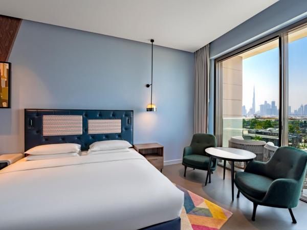 Hyatt Centric Jumeirah Dubai : photo 7 de la chambre chambre lit king-size avec balcon - vue sur ville
