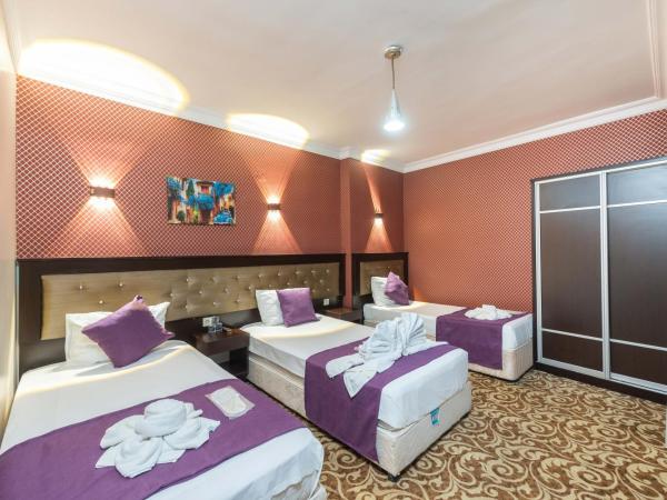 Grand Abimo Hotel : photo 1 de la chambre chambre triple standard