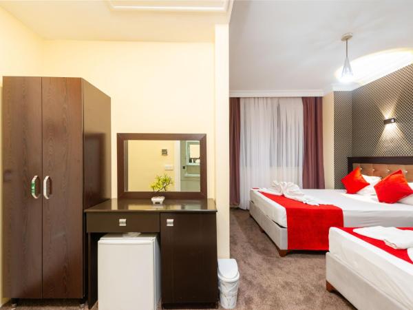 Grand Abimo Hotel : photo 4 de la chambre chambre triple standard