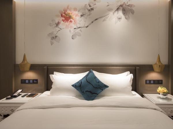 Paco Hotel Dongpu Guanghzou -Free Shuttle Bus for Canton Fair : photo 3 de la chambre chambre lit queen-size supérieure (sans fenêtre)