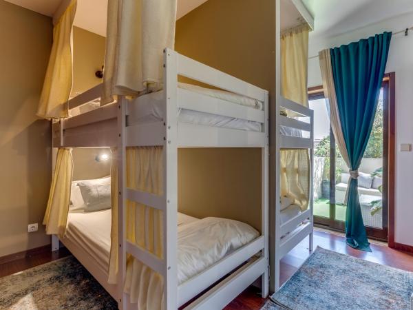 Garden in Town Hostel : photo 1 de la chambre lit dans un dortoir de 4 lits