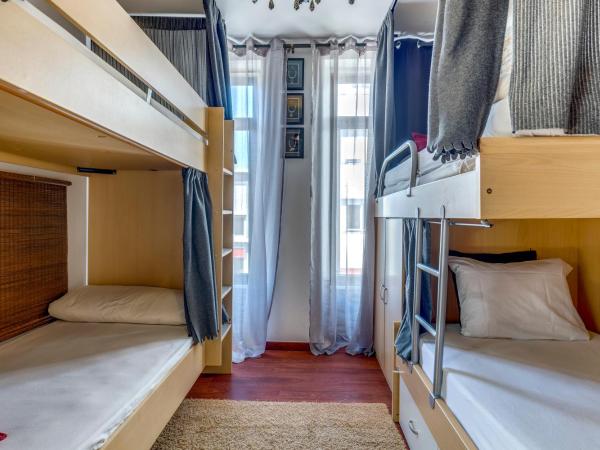 Garden in Town Hostel : photo 2 de la chambre lit dans dortoir pour femmes de 4 lits