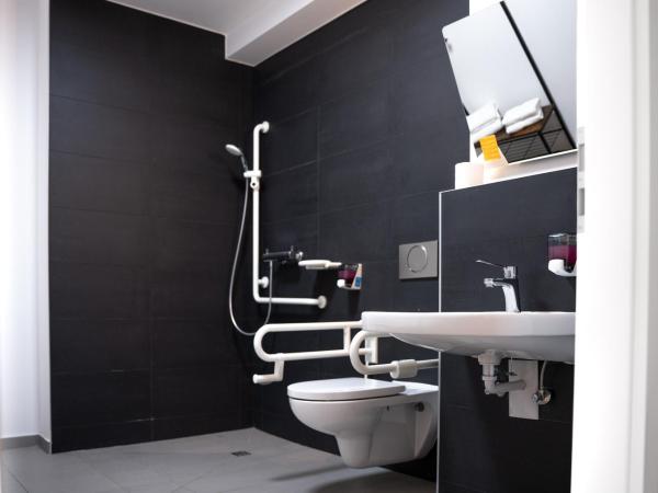 Gwuni Mopera : photo 4 de la chambre chambre lit king-size - accessible aux personnes à mobilité réduite