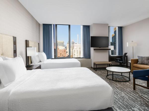 Fairfield Inn & Suites by Marriott New York Midtown Manhattan/Penn Station : photo 3 de la chambre suite lit queen-size avec canapé-lit