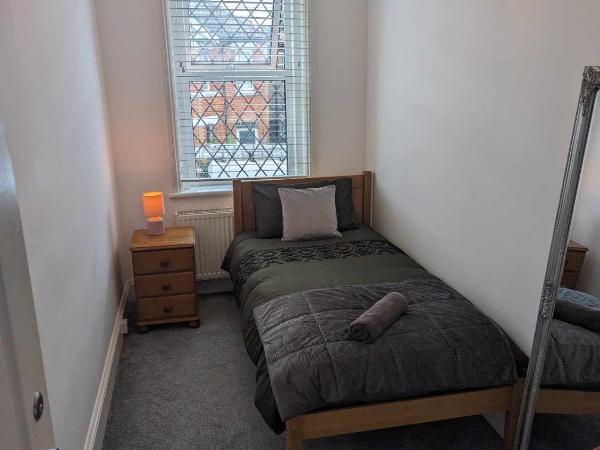 Cosy Bee and Apartment : photo 1 de la chambre chambre simple avec salle de bains commune