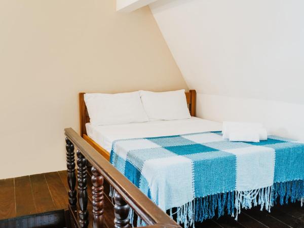 Pousada Casa da Pedra : photo 9 de la chambre chambre quadruple classique