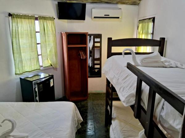 Pousada Mare Blue : photo 4 de la chambre chambre quadruple classique