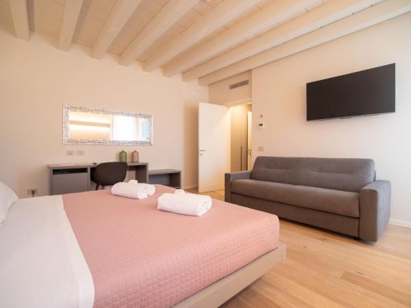 Calcirelli Suites : photo 8 de la chambre chambre familiale deluxe