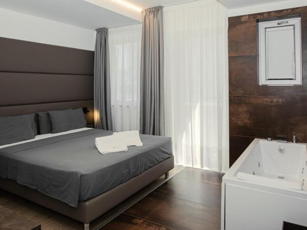 Hotel Leonardo Da Vinci Wellness SPA : photo 8 de la chambre suite deluxe avec baignoire spa