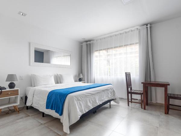 Hotel Ilha Branca Inn : photo 1 de la chambre chambre triple supérieure