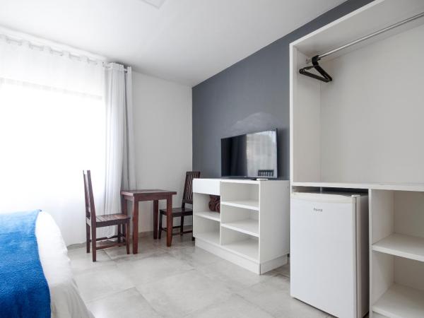 Hotel Ilha Branca Inn : photo 2 de la chambre chambre triple supérieure