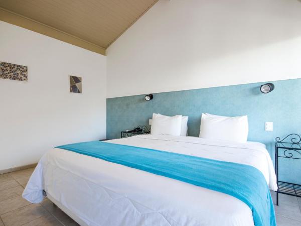 Hotel Ilha Branca Inn : photo 1 de la chambre chambre double avec balcon - vue sur mer